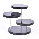 Display with four round black plateaus on 3 pins